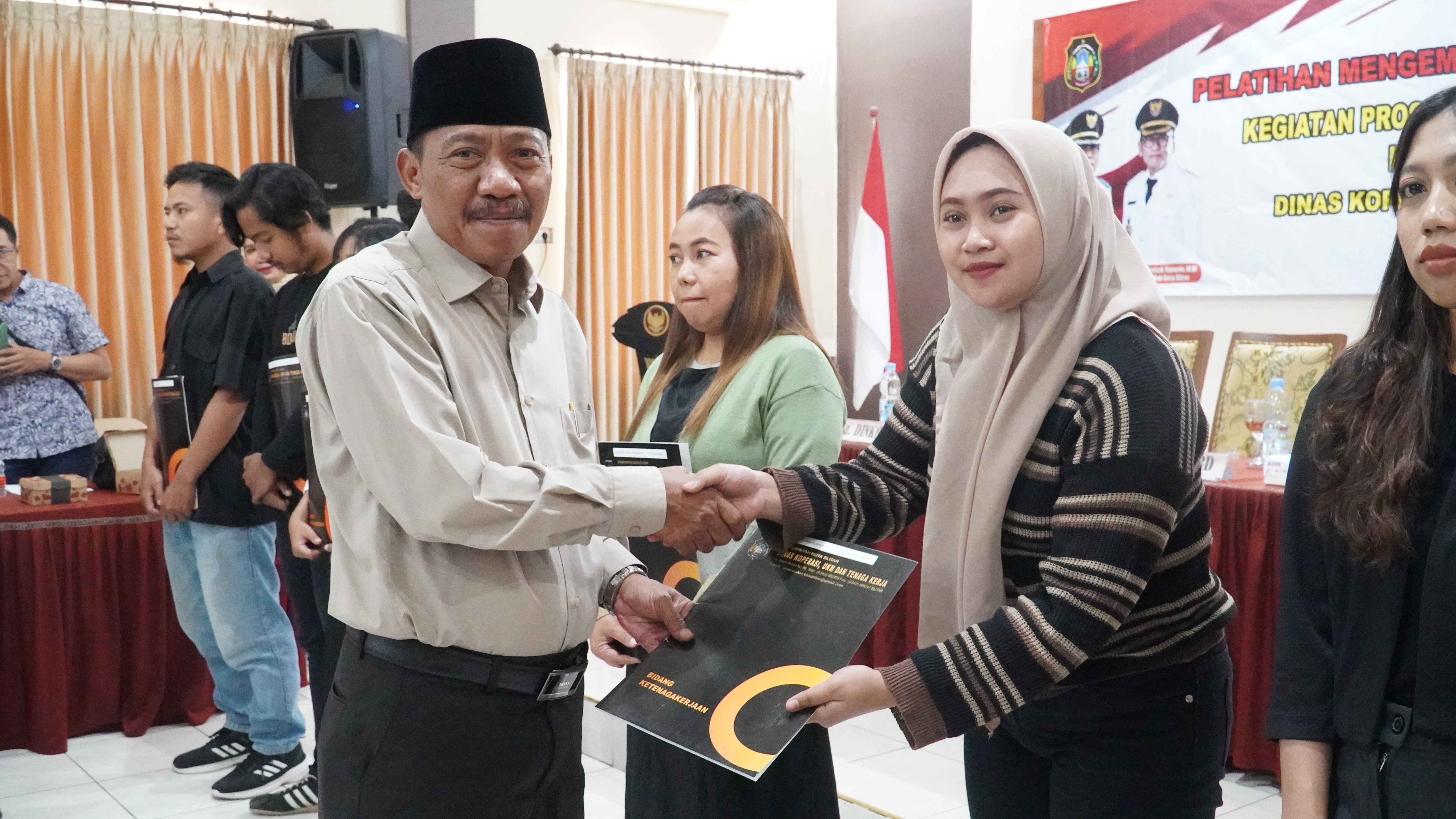 18 Februari 2025 - Pembukaan Pelatihan Menegemudi, Baby Massage, Tata Boga DINKOP dan TENAGA kERJA di Aula PKPRI